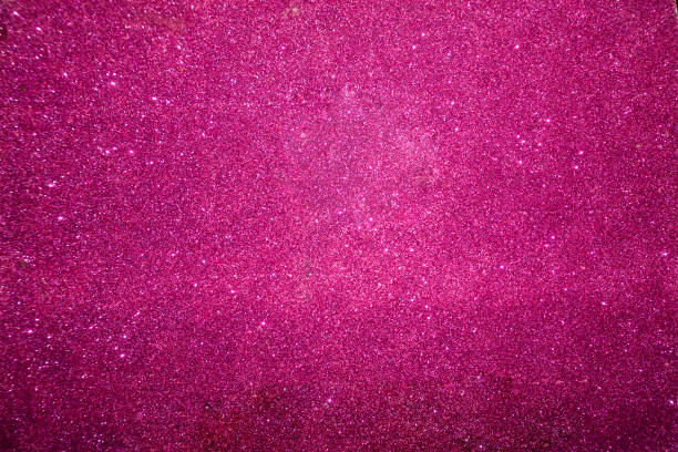 istock glitter textured background pink sparkles shimmering backdrop 1050037936