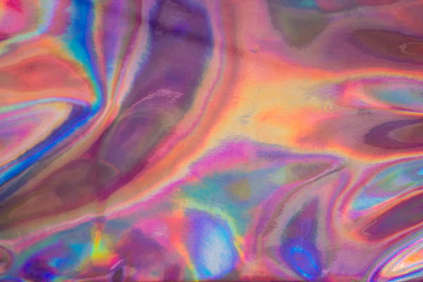istock background Laser Silver Color Holographic Mirror reflective surface material with rainbow coloring 1050040796