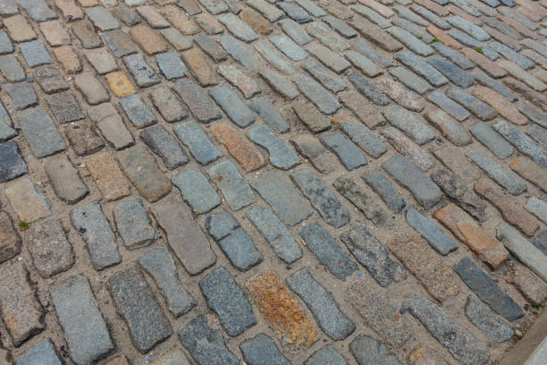 istock classic cobblestone city street 1050040918