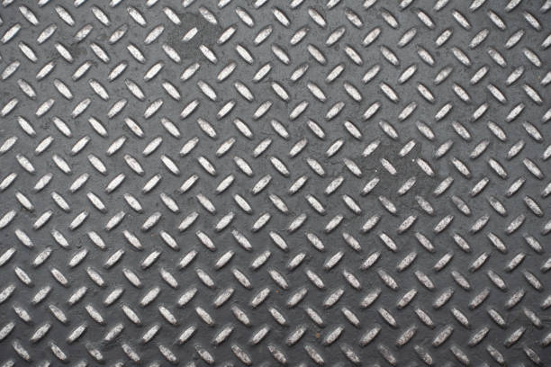 istock Metal texture background stainless diamond steel plate backdrop 1050040990