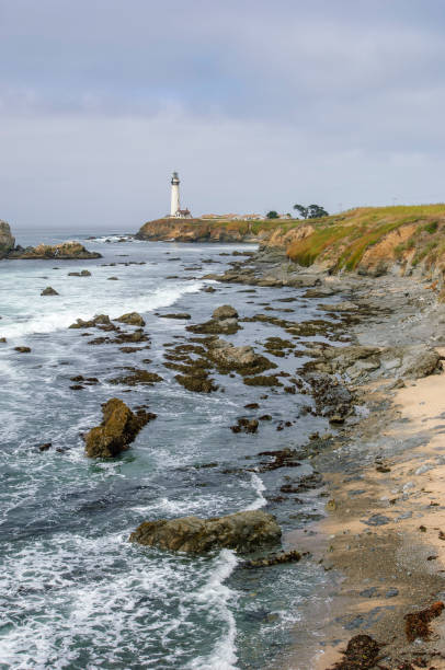 istock Pacific Coast Lighthouse and Rocky Shore 1050043940