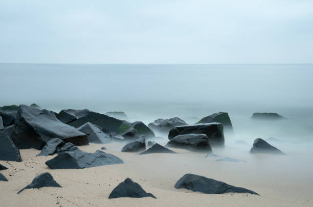 istock Rocks on beach in New Jersey 1050053142