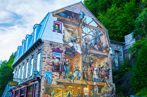 Famous trompe-l'oeil mural in the Lower Town of Old Quebec city known as Fresque du Petit-Champlain. It depicts milestones in the history of Cap-Blanc, Quebec City's working-class waterfront neighborhood, from the beginnings of New France until the present day.