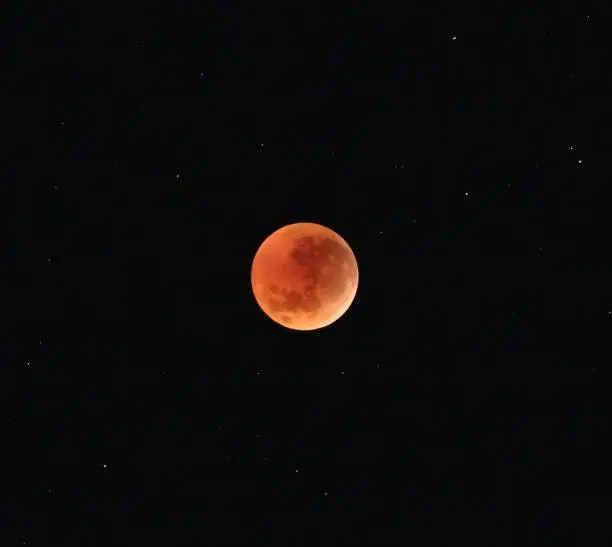 View of the lunar eclipse "Blood Moon" visible over Perth, Western Australia July 2018