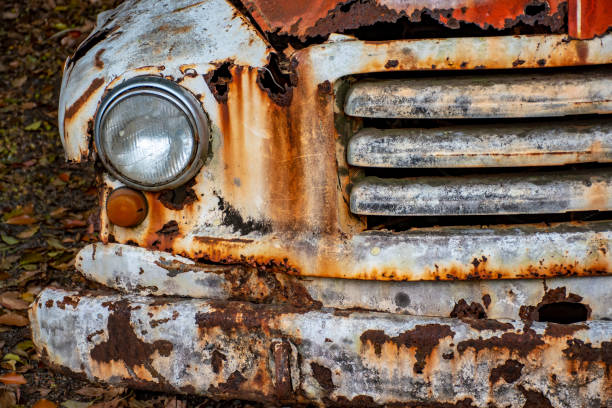 istock Close up of old rusting car in a paddock in rural Australia. 1050093954