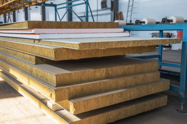 istock Stack of modern sandwich panel blocks from metal profile and wool foam for building warm and sound protected houses 1050104592