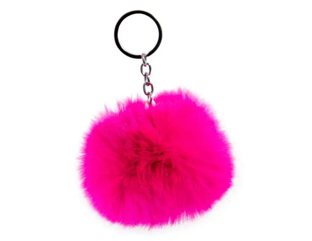 Photo of Fur ball key chain isolated on white background