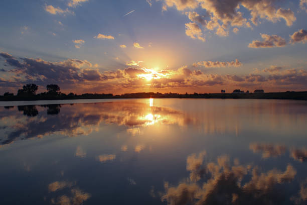 istock Beautiful sunset reflected in the lake. 1050114308
