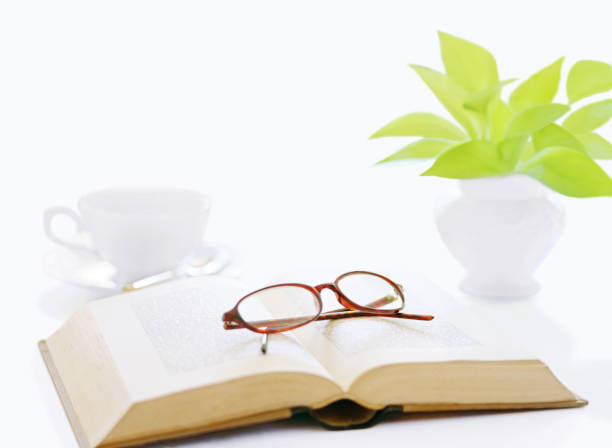 istock book and glasses  and coffee 1050124590