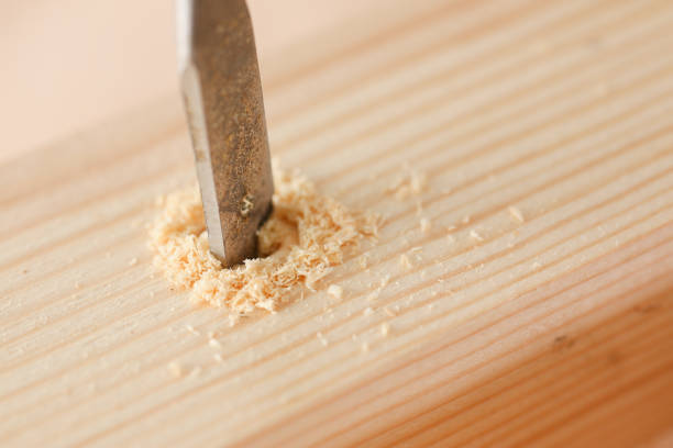 Close up Screwdriver drilling wood for carpenter