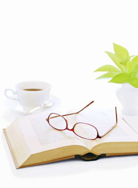 istock book and glasses  and coffee 1050125116