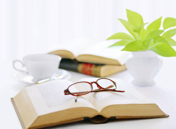 istock book and glasses  and coffee 1050127492