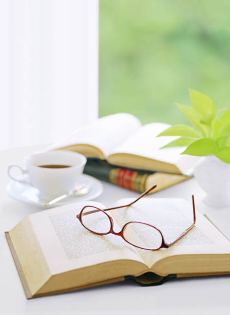 istock book and glasses  and coffee 1050127604