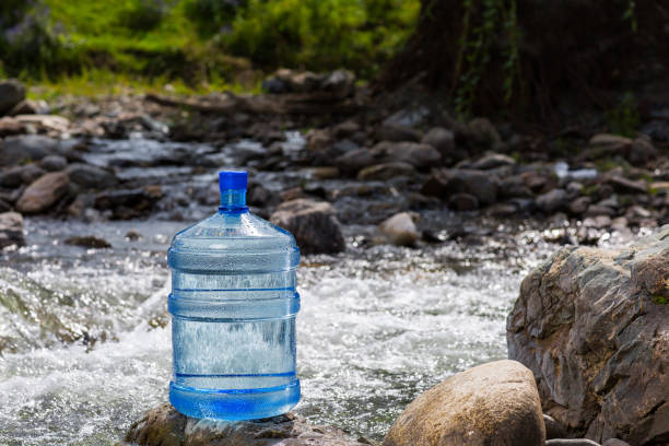 istock Natural drinking water in a large bottle 1050140546