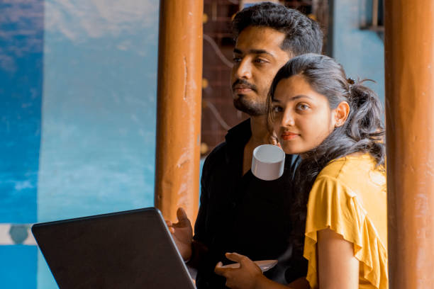 istock Young Couple Using Laptop in a farmhouse 1050148752