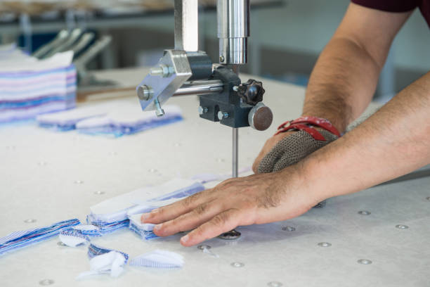 istock workshop in sewing shirts in a textile factory 1050160252