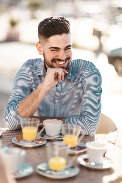 istock man tasting a coffee at the cafe 1050160492