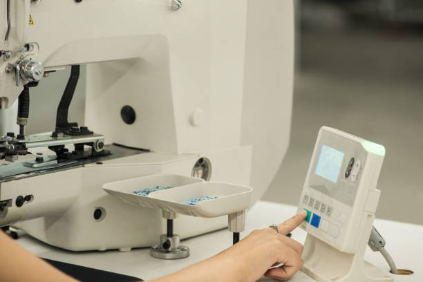 istock workshop in sewing shirts in a textile factory 1050161142