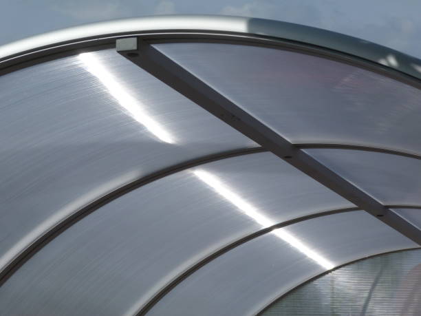 istock curved glass hood abstract under blue sky 1050162780