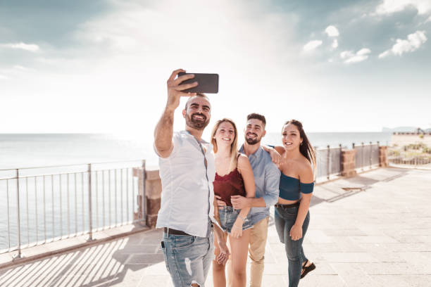 istock friends take a selfie on the street 1050162820