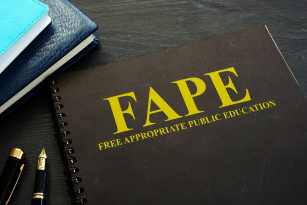 istock Free appropriate public education FAPE book on a desk. 1050184248