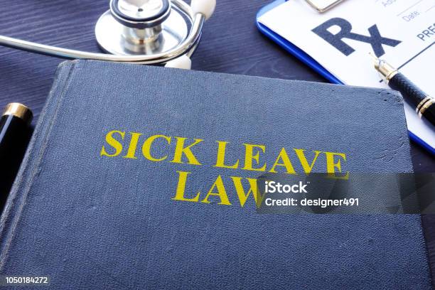 Sick Leave Law Book And The Stethoscope Stock Photo - Download Image Now - Sick Leave, Leaving, Law