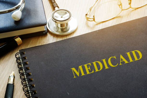 medicaid concept. documents, pen and stethoscope. - currency stethoscope medicare usa imagens e fotografias de stock