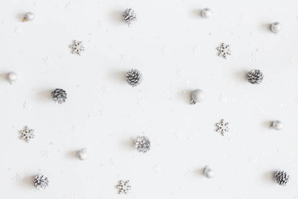 istock Christmas composition. Christmas silver decorations on white background. Flat lay, top view 1050189742