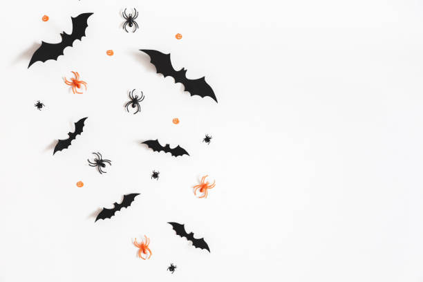 istock Halloween decorations on white background. Halloween concept. Flat lay, top view, copy space 1050189876