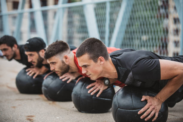 istock Push-ups with medicine ball 1050190284