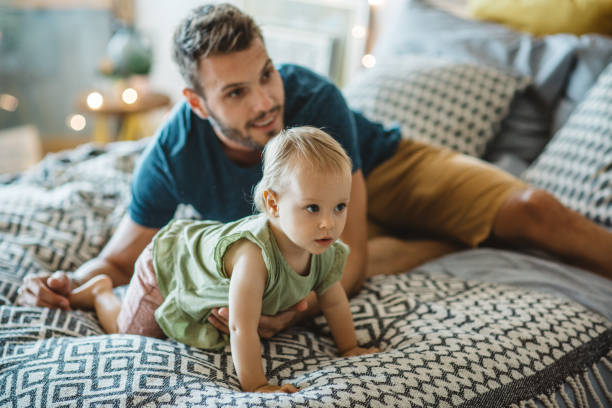 istock Father and daughter spend weekend at home 1050193418