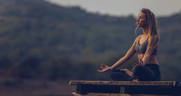 istock Meditation by the lake 1050199276