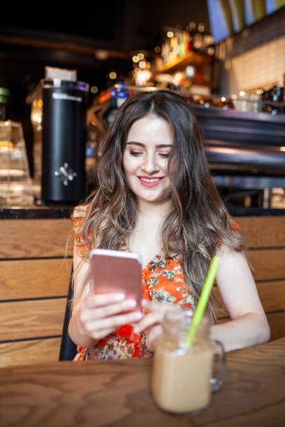 istock woman texting on the phone 1050202834