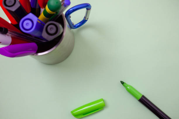 istock Design business concept Empty copy text for Web banners promotional material mock up template Scratched table cup with markers ideas messages workspace messy stain 1050205684