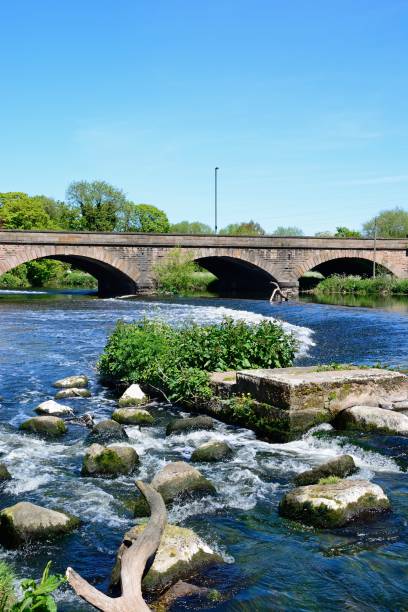istock Trent bridge and river, Burton upon Trent. 1050212762