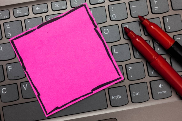 istock Design business concept Empty copy space modern abstract background Pink paper keyboard Inspiration communicate ideas messages Red markers 1050212836