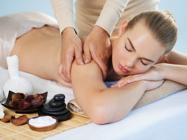 istock Woman having massage in the spa salon 1050229274