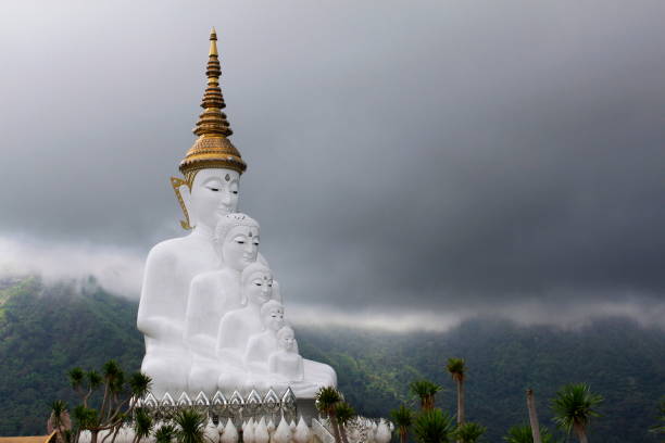 istock It represents five traditional Buddha who visited the earth. The Buddhas are nested together in the meditation pose, looking out over the valley. Each one is slightly larger than one before. 1050232422