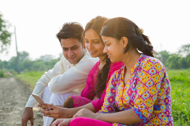istock Friends using mobile phone - stock images 1050235378