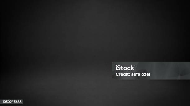 Black Studio Background Stock Photo - Download Image Now - Black Background, Backgrounds, Gray Color