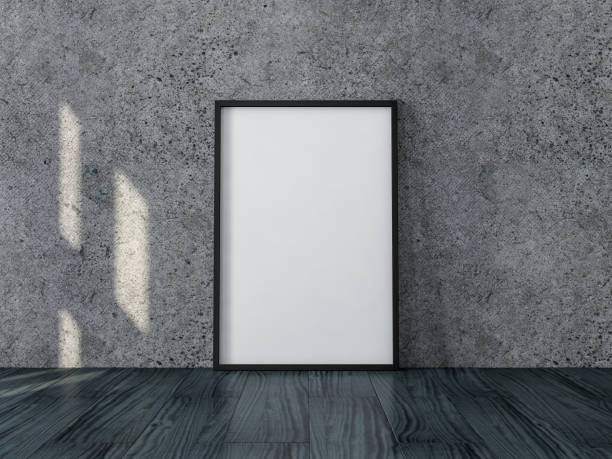 istock Poster with Black Frame, canvas Mockup standing near concrete wall on the floor 1050245756