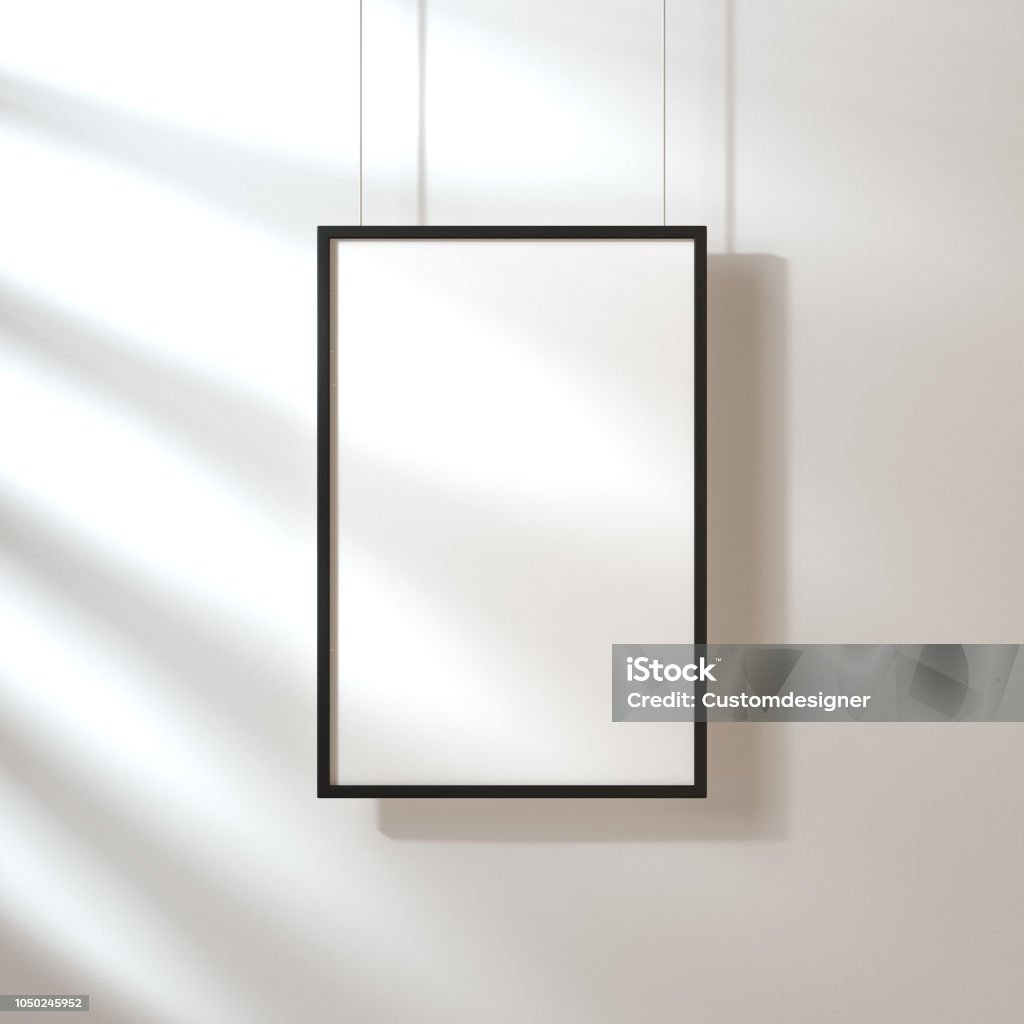 White poster with black frame mockup hanging on the wall with shadows White poster with black frame mockup hanging on the wall with shadows, 3d rendering Poster Stock Photo