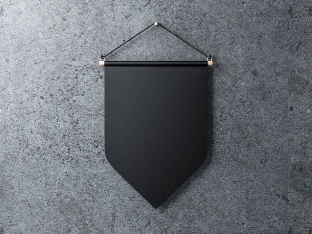 istock Black Pennant hanging on a concrete wall 1050245954