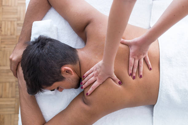 istock Man having a massage in a wellness center 1050258126