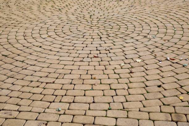 istock Stone sidewalk in the park. 1050264160