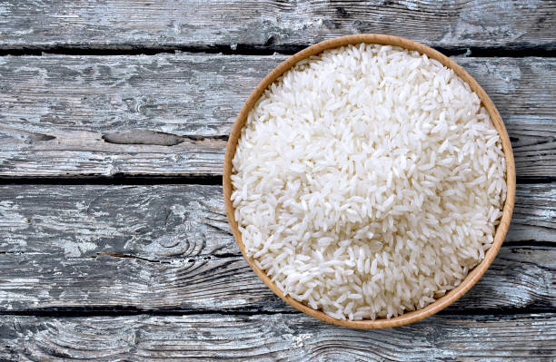 istock Healthy eating scene with raw, parboiled rice 1050273780