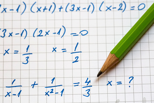 Close-up of Hand written Mathematical Formulas. Concept of Education