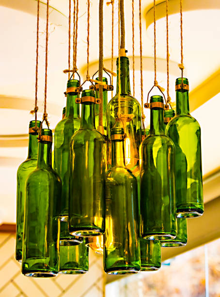 istock Lamps from old wine bottles against 1050280984