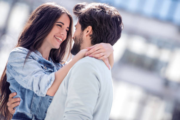 istock Happy romantic people on street 1050284004