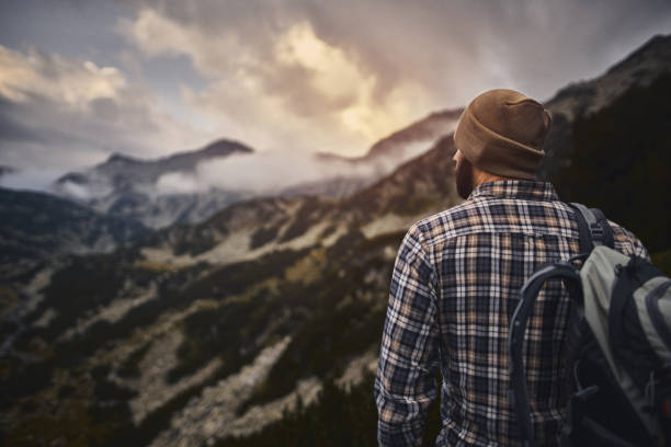 istock Traveling alone in the mountains at sunset 1050284766